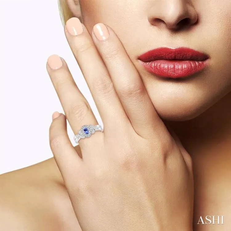 5x3 MM Oval Cut Tanzanite and 1/50 Ctw Single Cut Diamond Ring in Sterling Silver