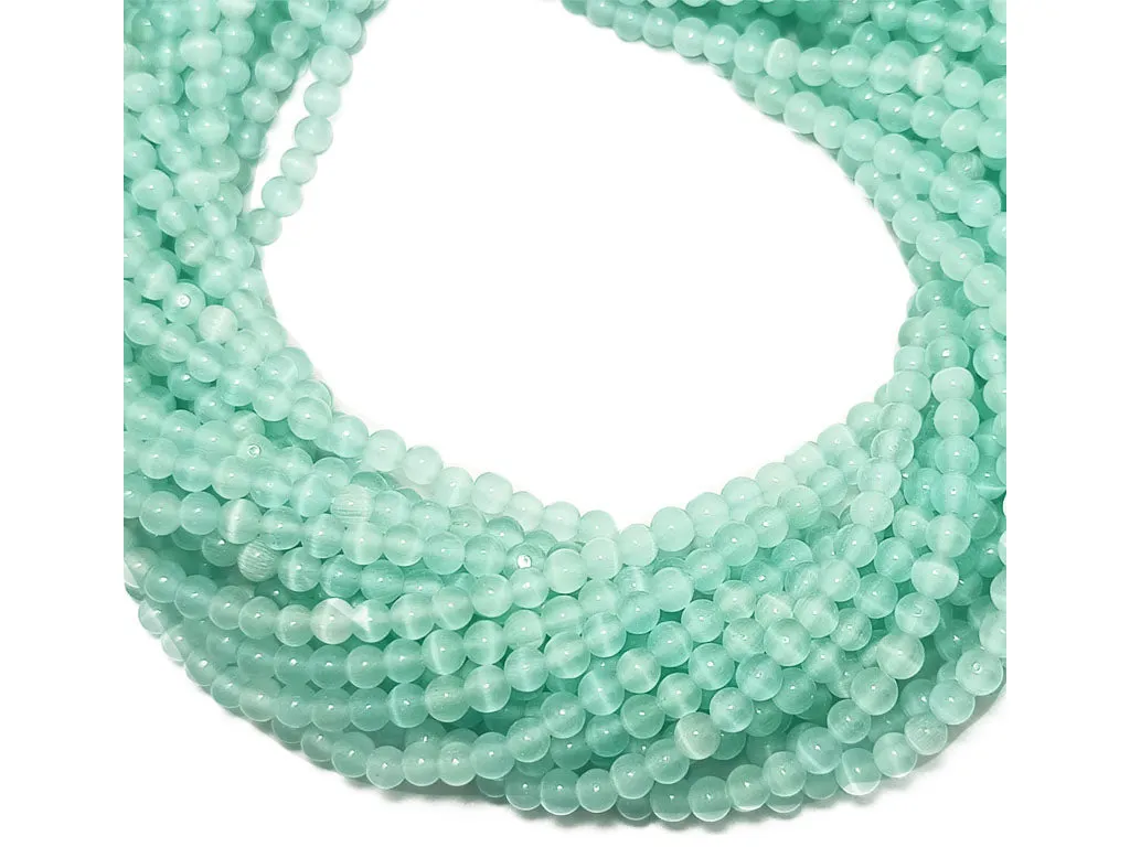 Light Turquoise Spherical Monalisa Glass Pearl Beads