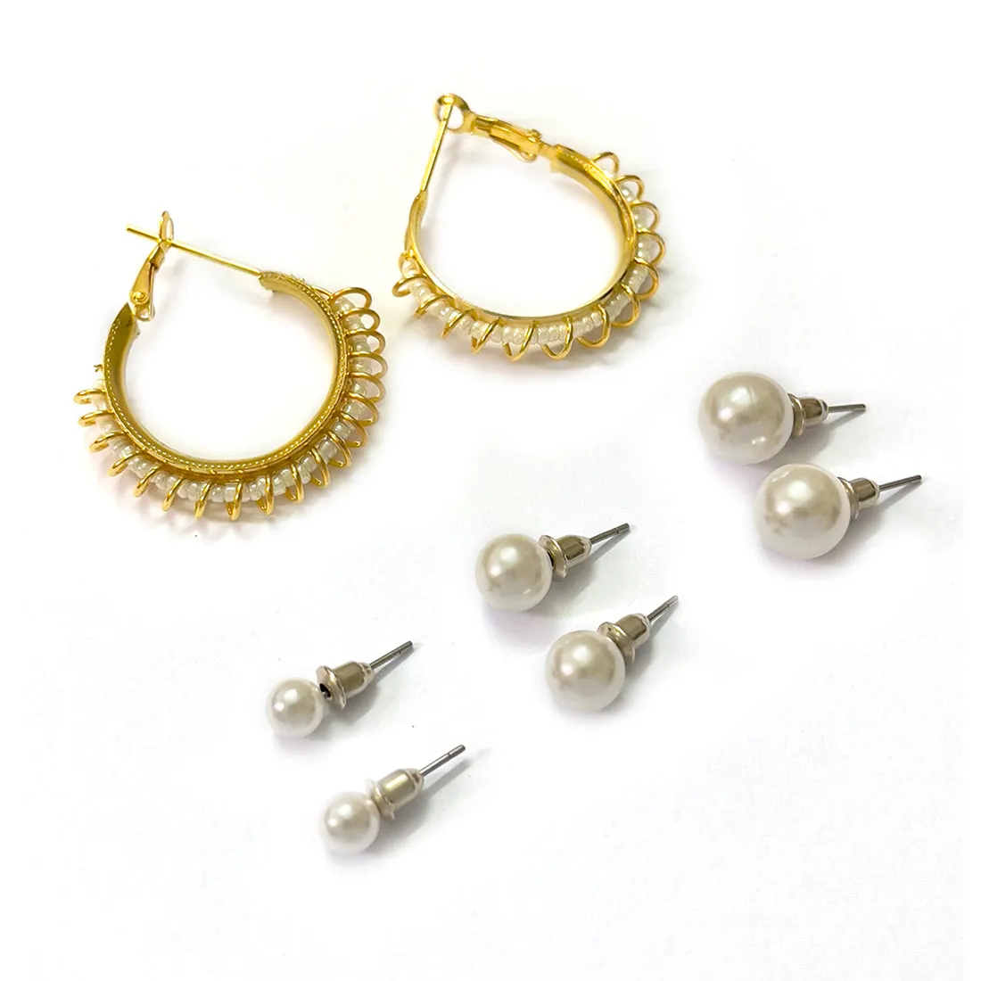 Set Of 4 White Pearl Studs In Different Sizes & Gold-Toned Wire Wrapped Hoop Earrings